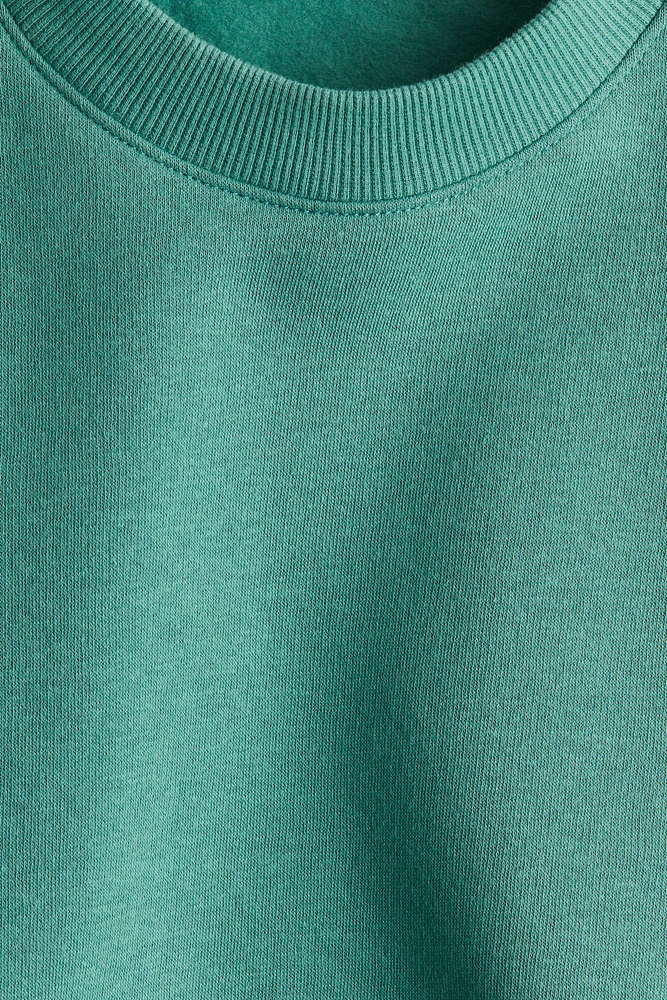 Chandail grande taille avec encolure ras-du-cou