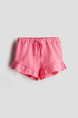 Short en jersey avec broderie anglaise