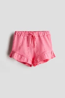Short en jersey avec broderie anglaise