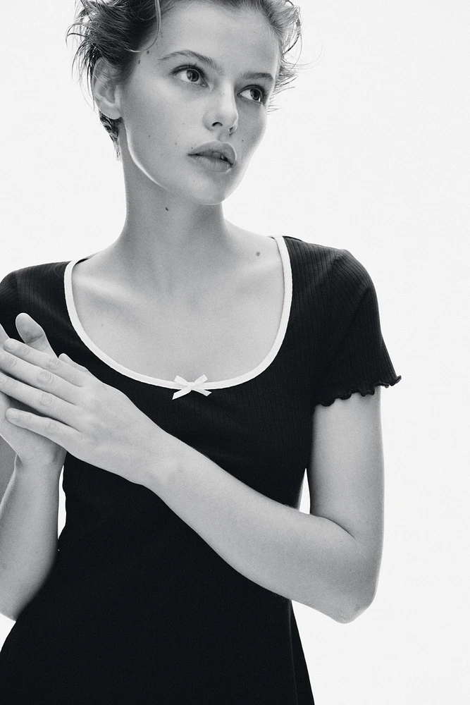 Overlocked-Trim Dress with Flared Skirt