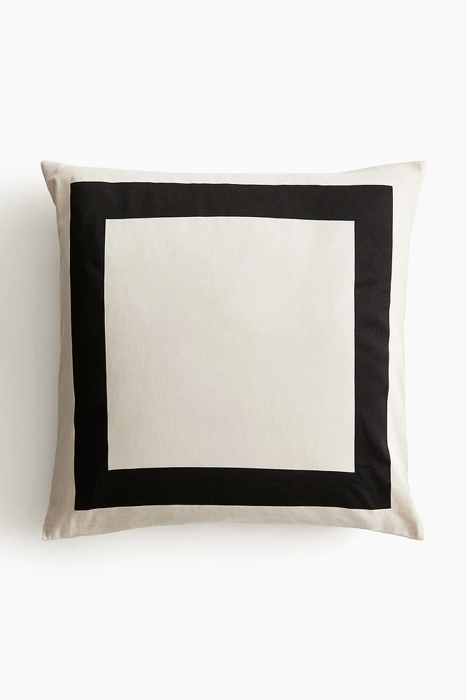 Housse de coussin en satin de coton