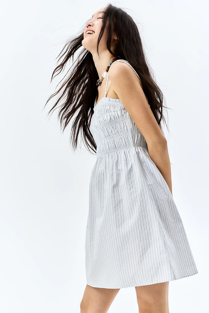 Robe en coton à corsage nid d'abeille