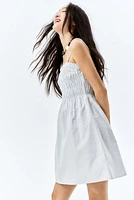 Robe en coton à corsage nid d'abeille
