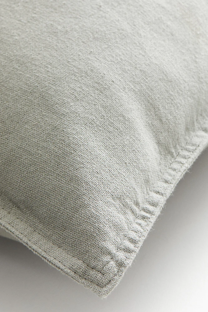 Housse de coussin en lin mélangé