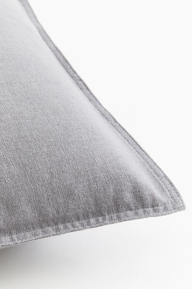 Housse de coussin en lin mélangé