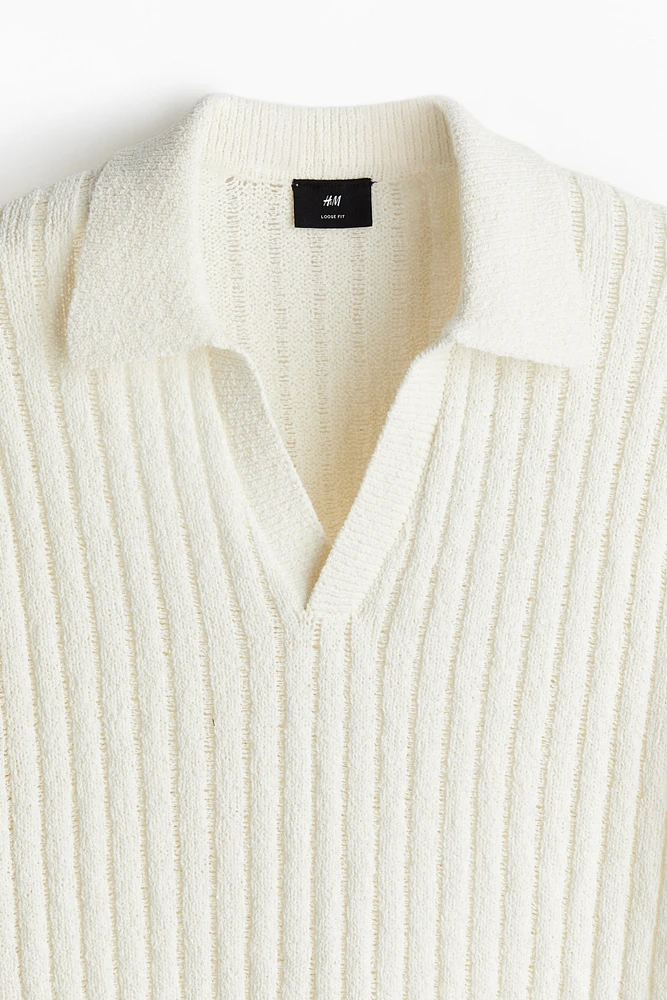 Polo flottant en tricot côtelé