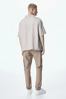 Pantalon cargo classique en sergé