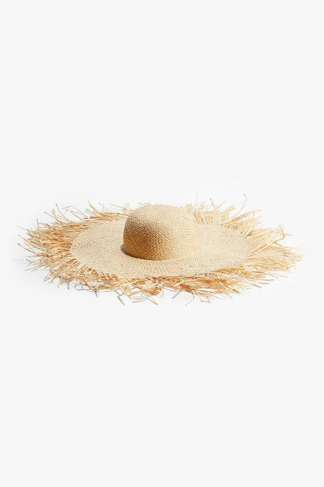 Frayed Straw Hat