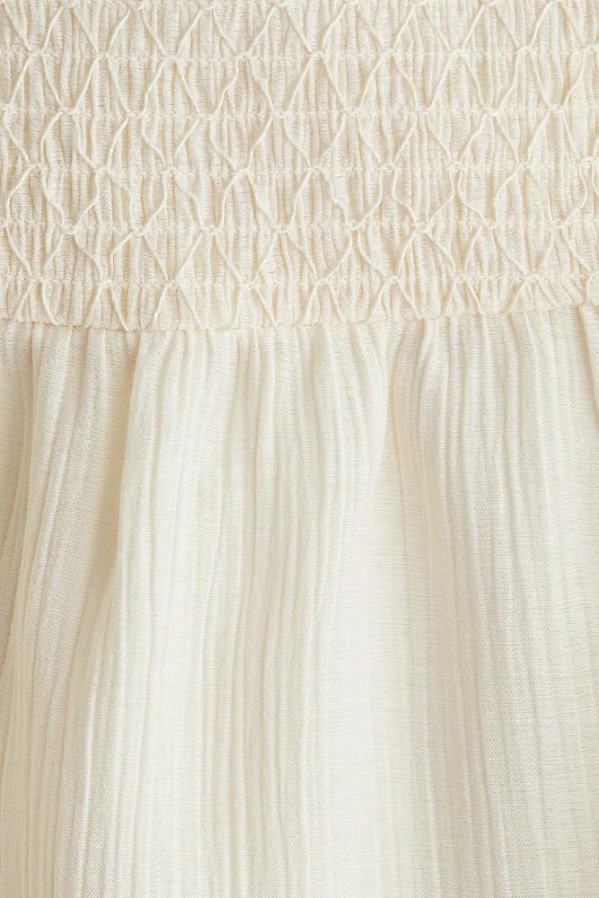 Robe smockée avec bretelles fines