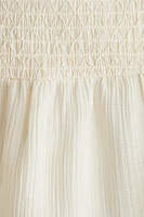 Robe smockée avec bretelles fines