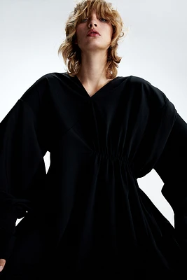 Robe asymétrique en crêpe