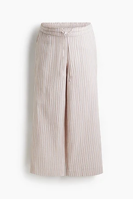 MAMA Pantalon large en mousseline