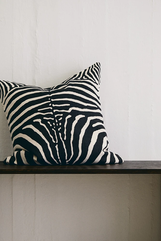 Housse de coussin avec imprimé animal
