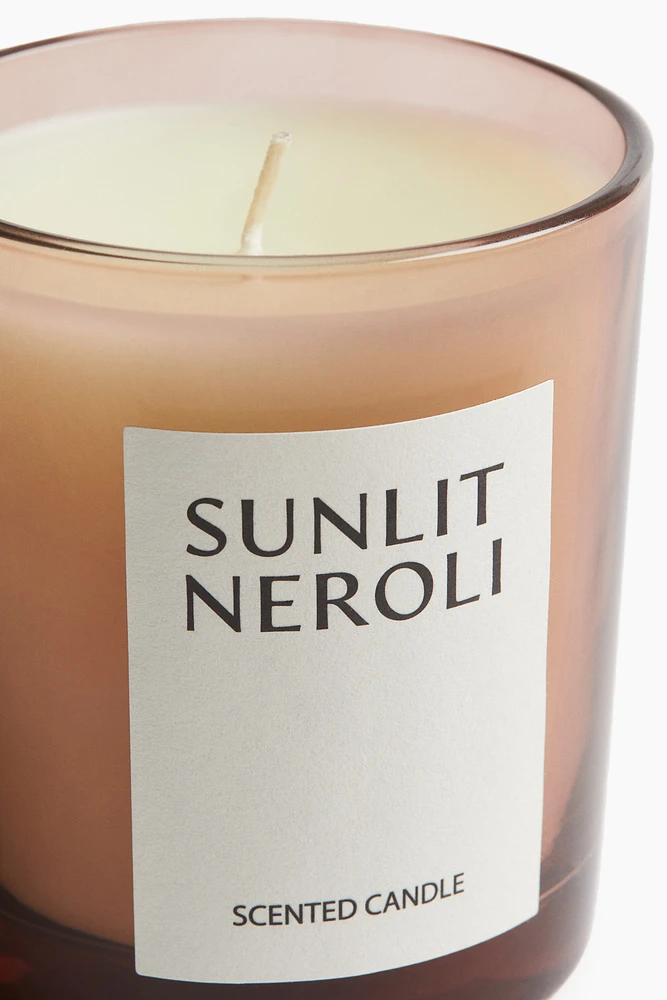 Bougie parfumée dans un pot en verre