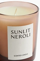 Bougie parfumée dans un pot en verre