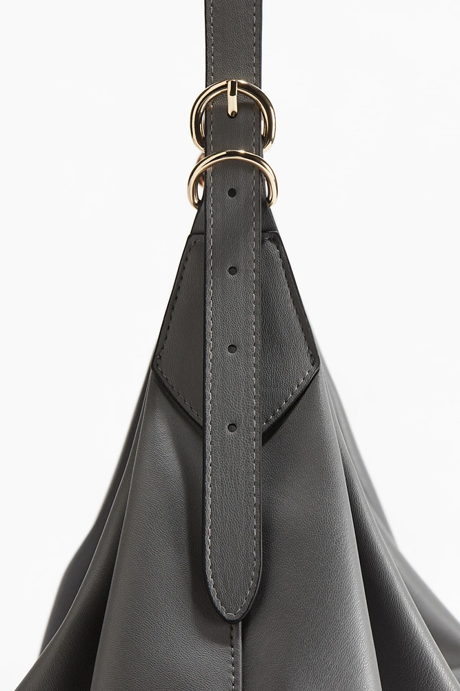 Sac à bandoulière de forme arrondie
