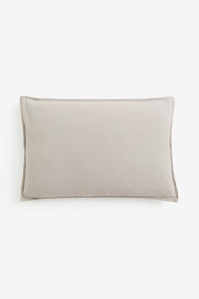 Housse de coussin en lin mélangé