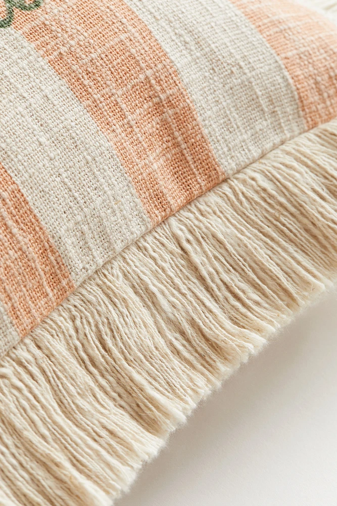Housse de coussin frangée en lin mélangé