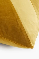 Housse de coussin rayée en velours