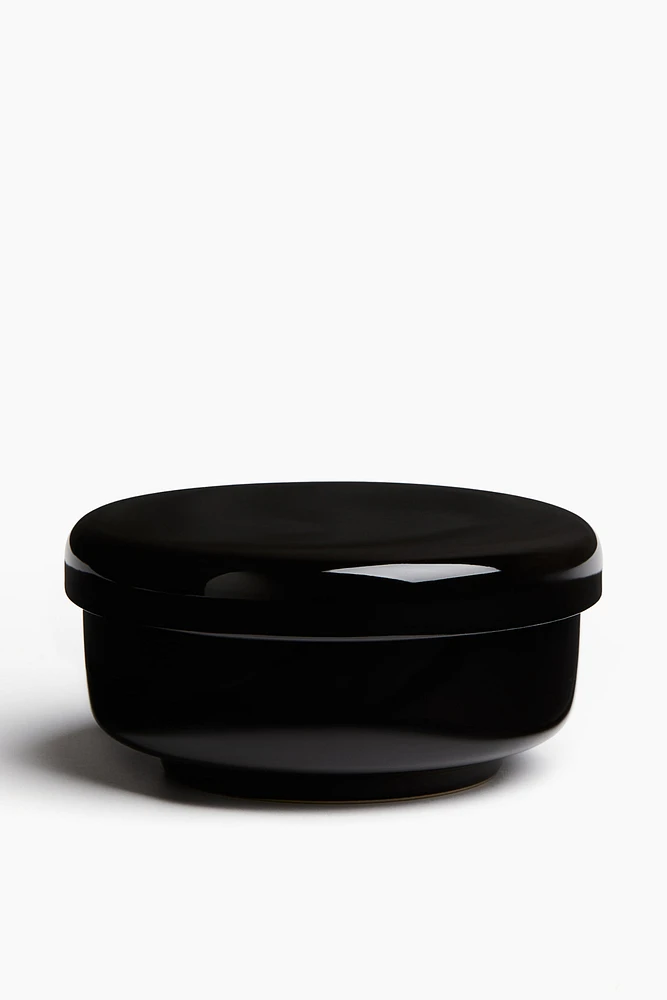 Bougie parfumée dans un pot en céramique