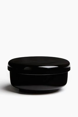 Bougie parfumée dans un pot en céramique