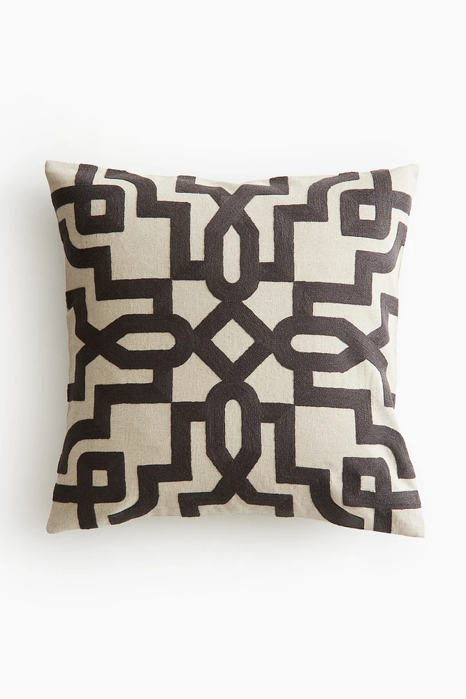 Housse de coussin à motif