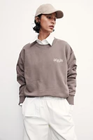 Sweatshirt with Text Motif