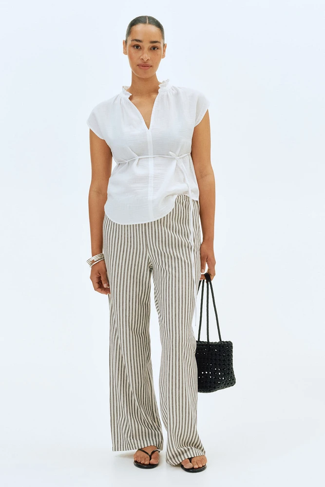 Blouse MAMA en mousseline avec ceinture à nouer