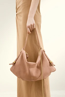 Sac à bandoulière en cuir velours
