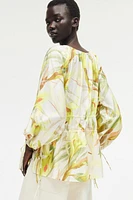 Blouse avec cordons de serrage