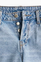 Short taille basse au genou en denim