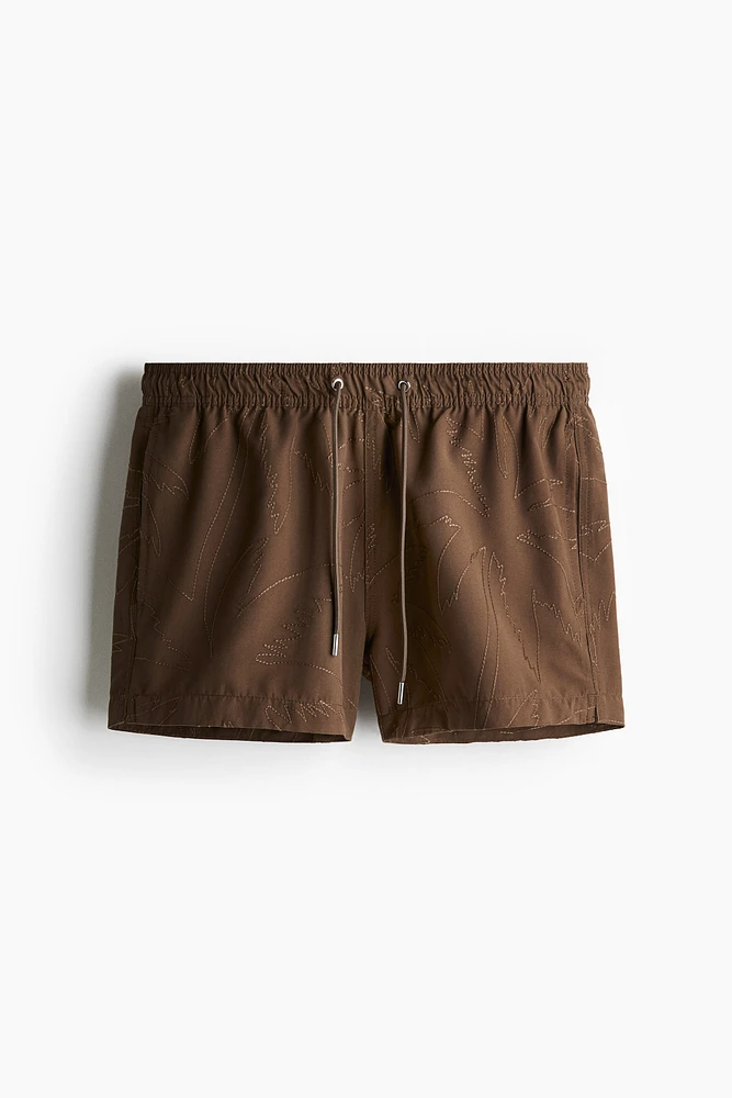Embroidered-Pattern Swim Shorts