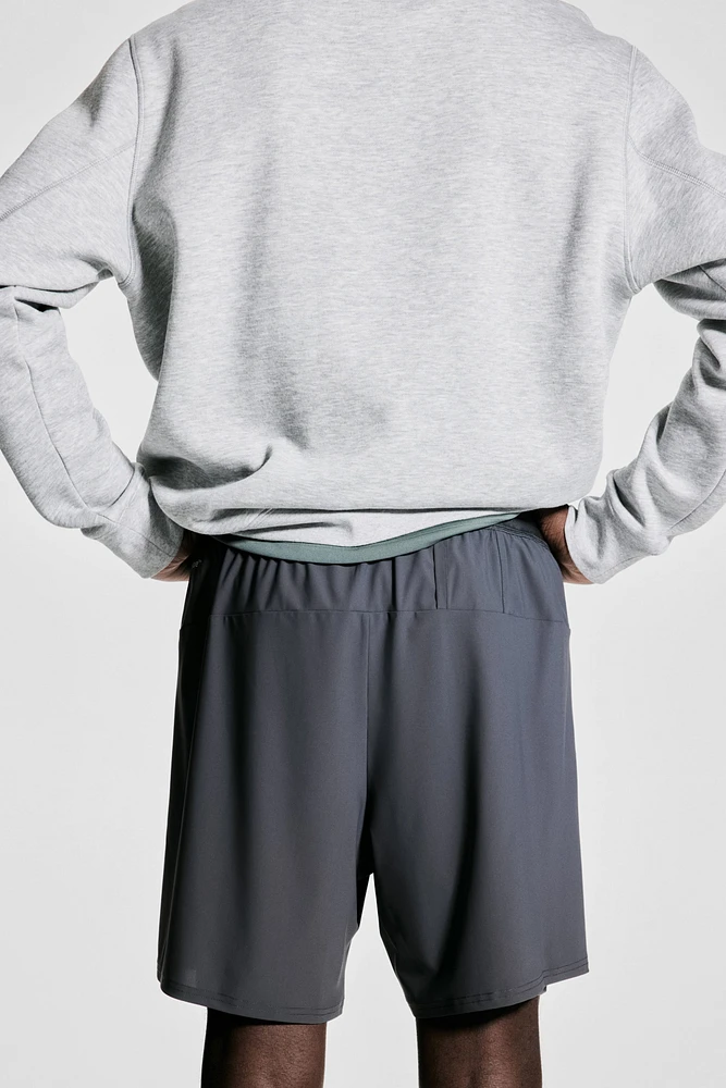 Short de sport mi-long 2-en-1 DryMove™