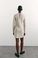 Robe en tricot avec poches devant