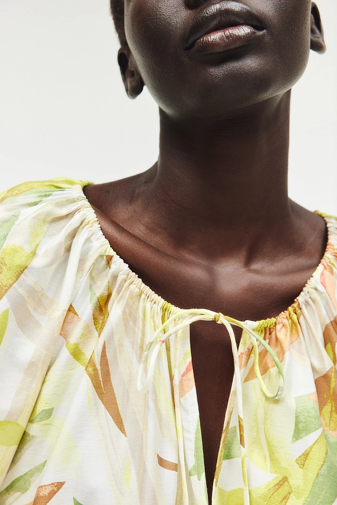 Blouse avec cordons de serrage