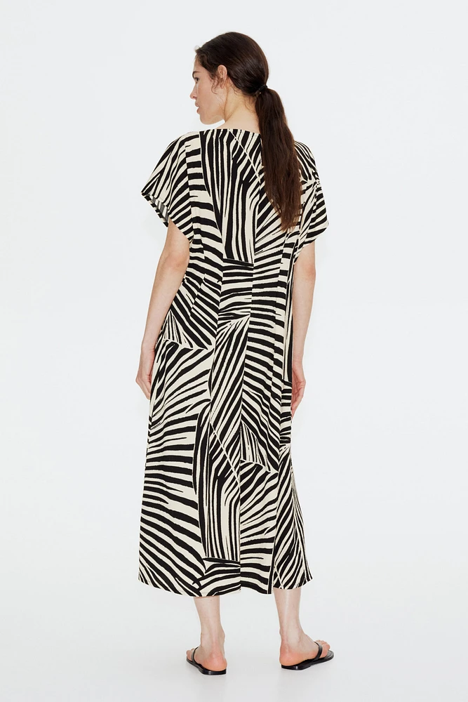 Robe maxi avec taille marquée