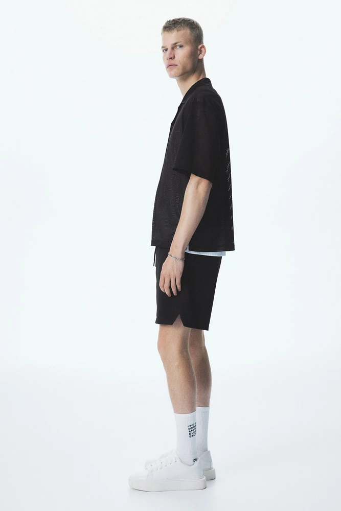 Short classique en filet