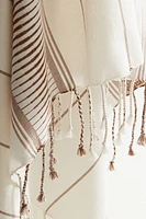 Serviette de plage en tissu jacquard