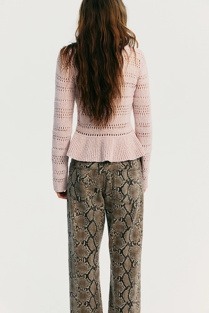 Chandail péplum en tricot pointelle