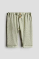 Pantalon à boutons