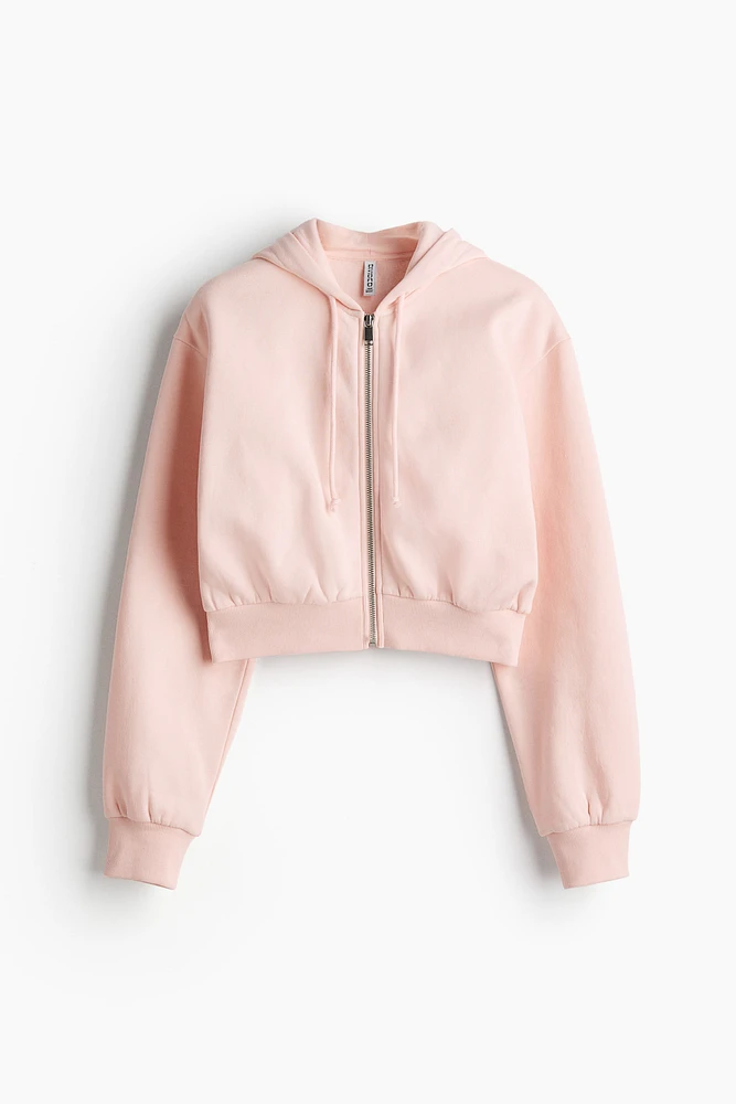 Veste courte avec capuchon et glissière