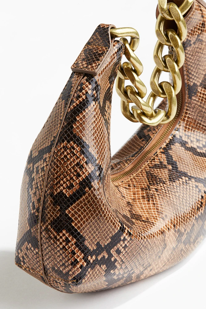 Petit sac à se portant l'épaule