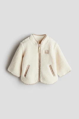 Veste en tissu peluche