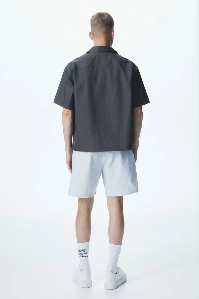 Chemise utilitaire à manches courtes coupe ample