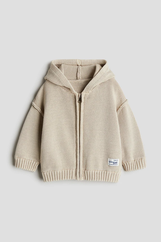 Veste tricot de coton, capuche, fermeture éclair