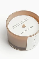 Bougie parfumée dans un pot en verre