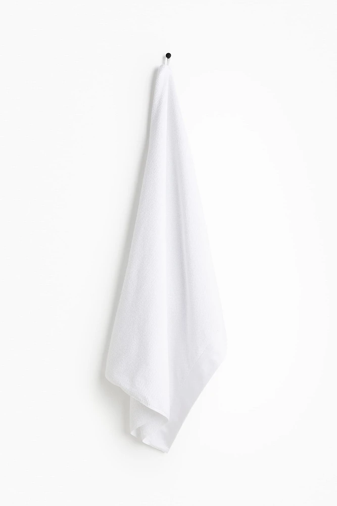 Serviette de bain en coton éponge