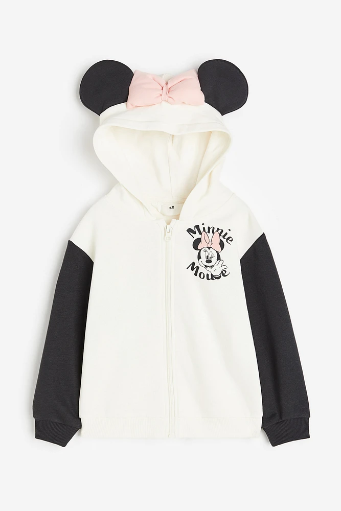 Veste à capuchon imprimée et glissière