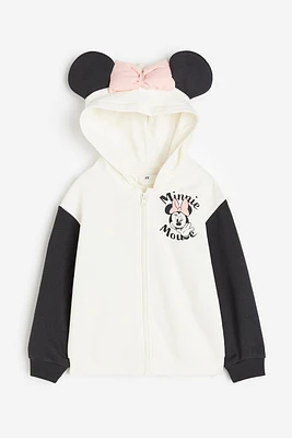 Veste à capuchon imprimée et glissière