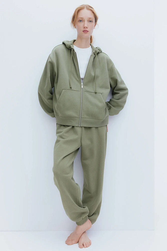Veste à capuchon glissière